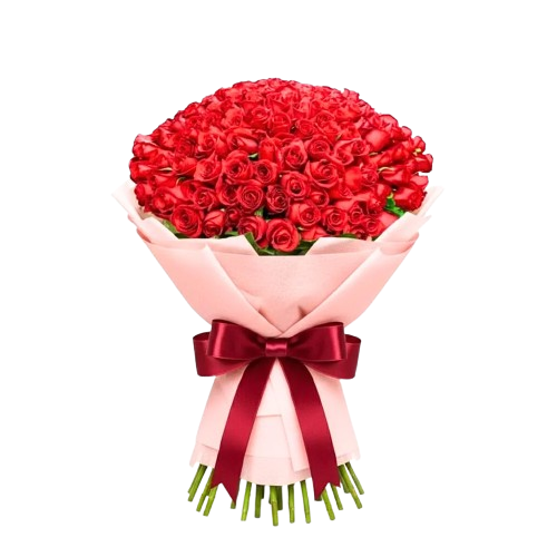 Petit bouquet de roses rouges en emballage rose